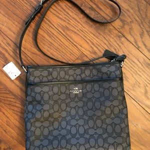 Authentic black coach messenger bag